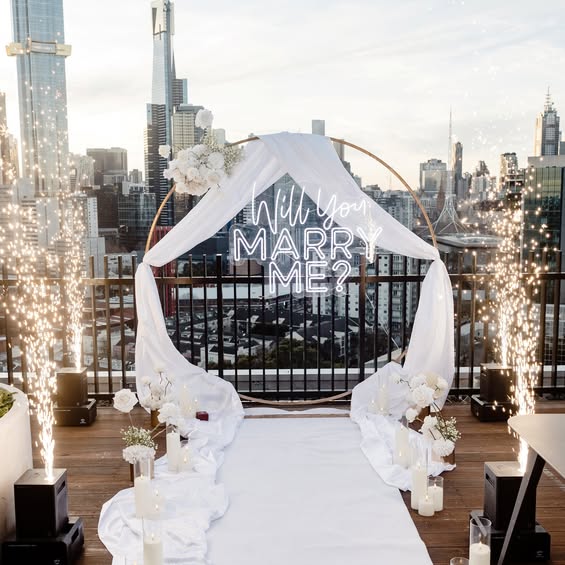 Melbourne rooftop proposal with four cold sparks